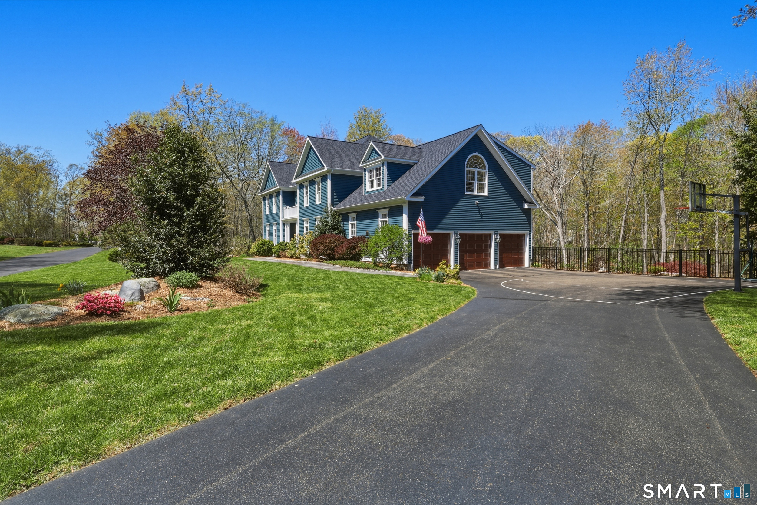 7 Timber Lane Guilford, CT 06437 - Photo 2 of 40 a front view of house with yard and green space
