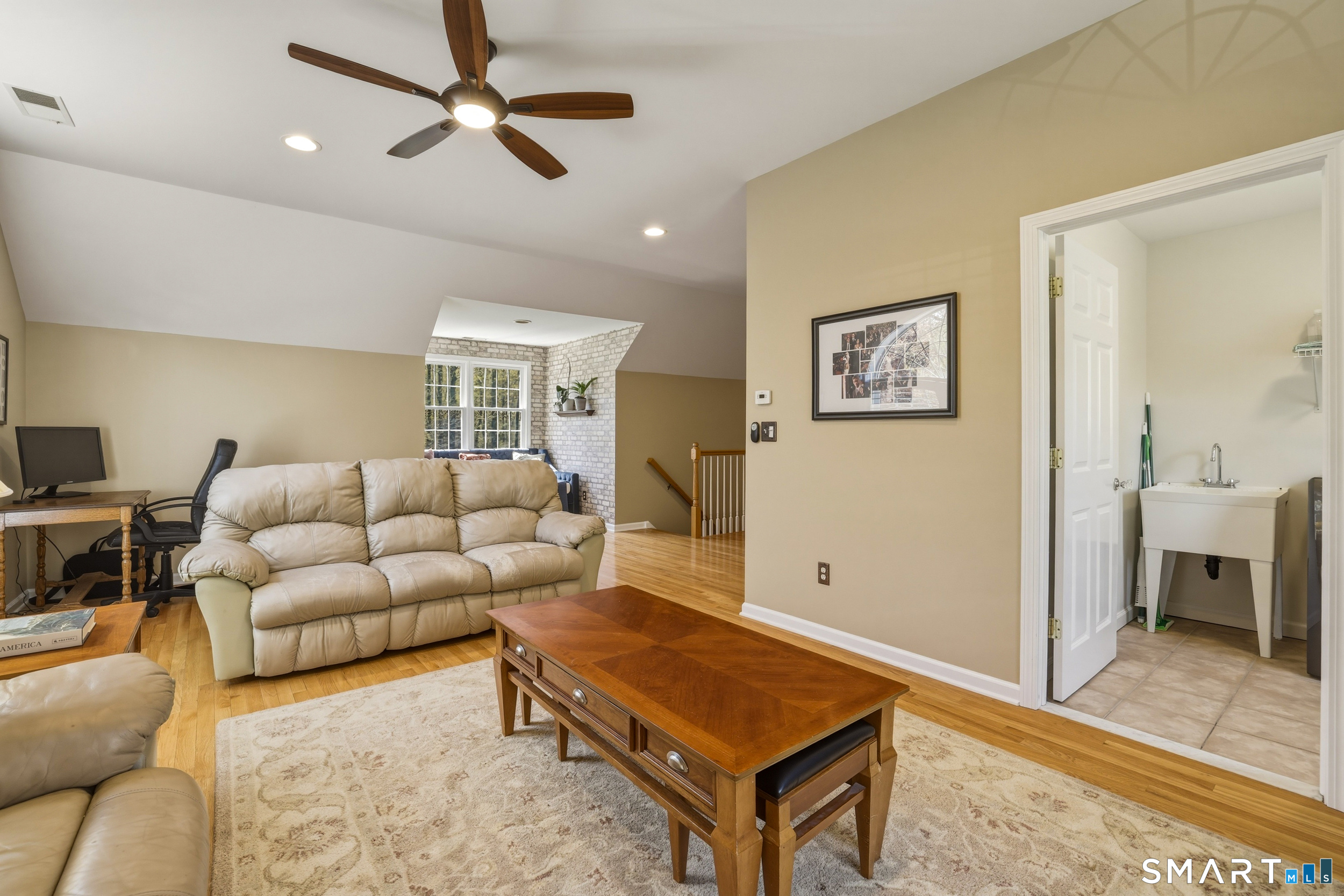 7 Timber Lane Guilford, CT 06437 - Photo 23 of 40 a living room with furniture and a rug