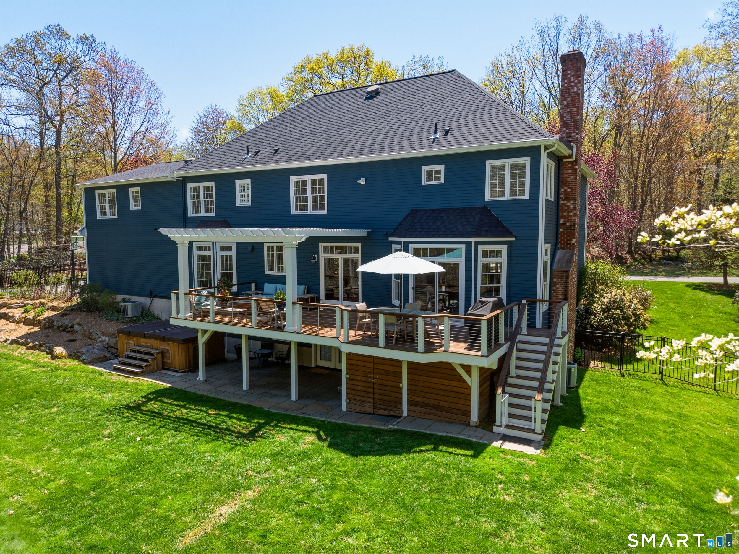 7 Timber Lane Guilford, CT 06437 - Photo 32 of 40 a view of a house with a yard porch and sitting area