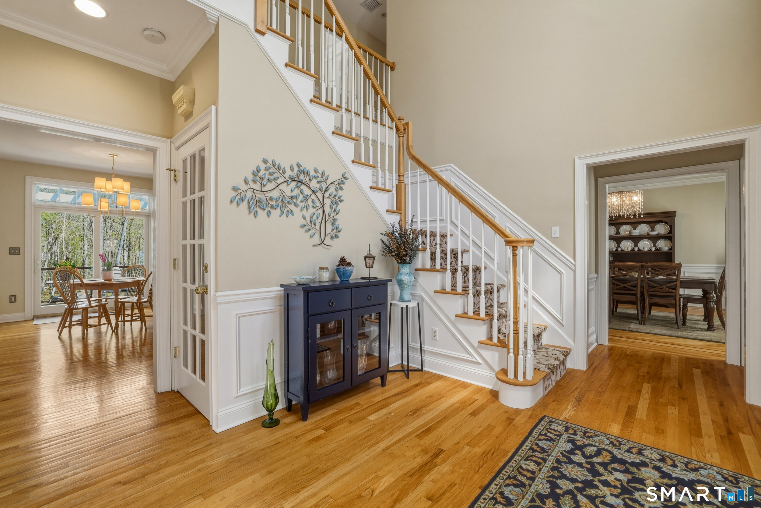 7 Timber Lane Guilford, CT 06437 - Photo 4 of 40 a view of entryway and hall with wooden floor