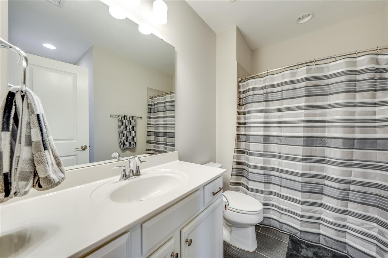 7504 Pinaster Place Raleigh, NC 27613 - Photo 26 of 30 Private full bath for the basement bedroom (bedroom 5) - perfect in law suite! Bathroom