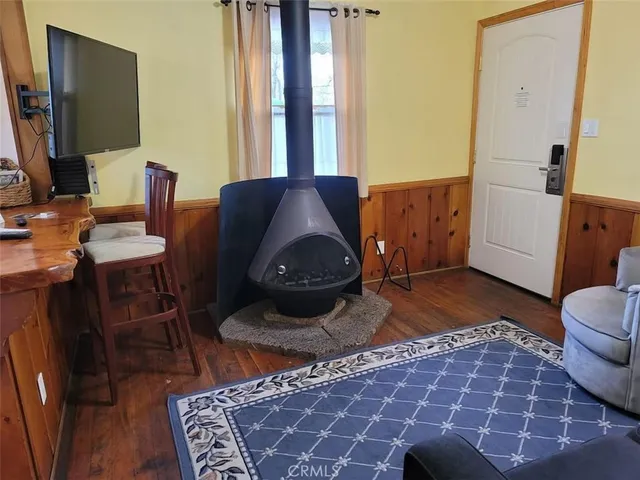 a living room with a couch and a flat screen tv