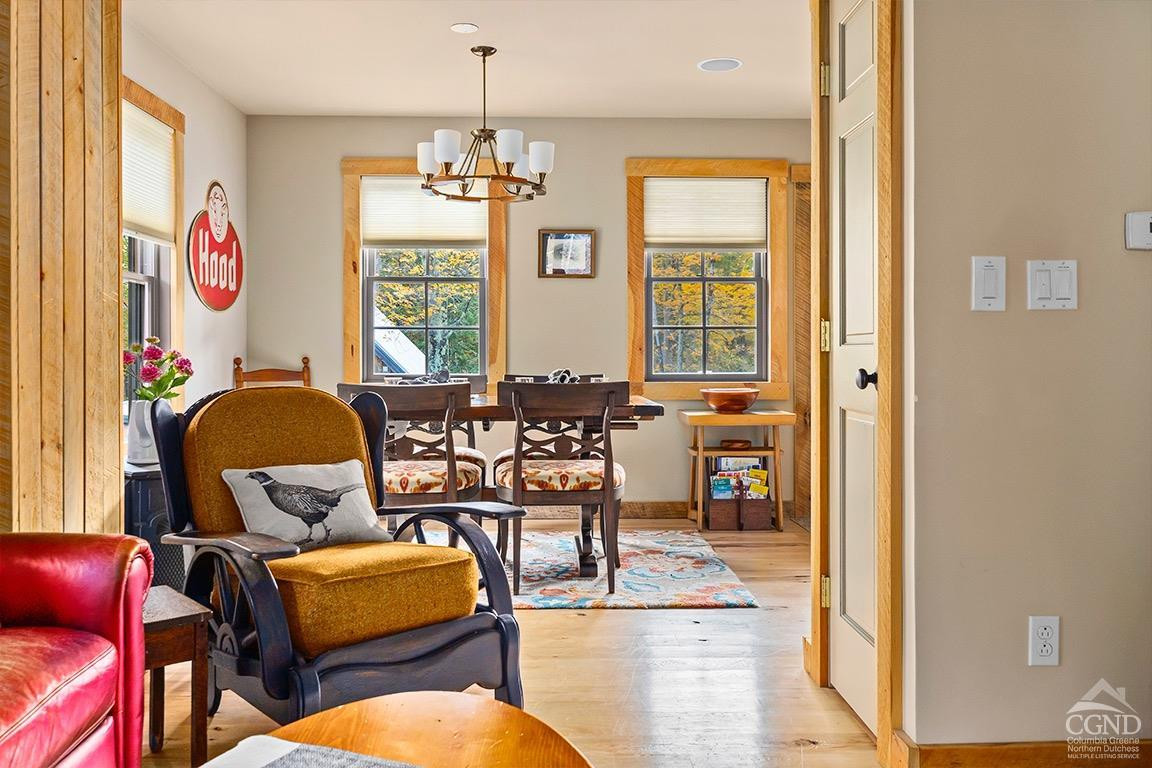 214 Fog Hill Road Austerlitz, NY 12017 - Photo 18 of 38 a living room with patio furniture and a window