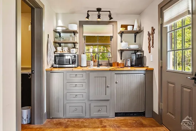 a bedroom with a bed and a window in it