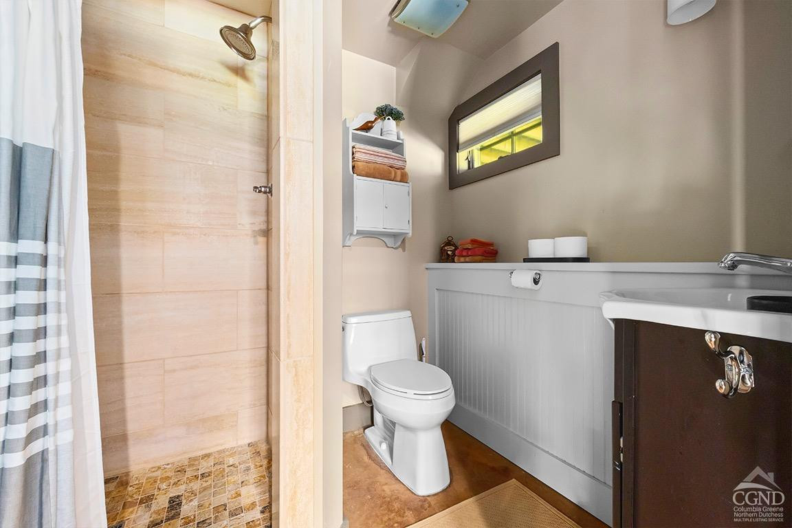 214 Fog Hill Road Austerlitz, NY 12017 - Photo 31 of 38 a bathroom with a sink toilet and shower