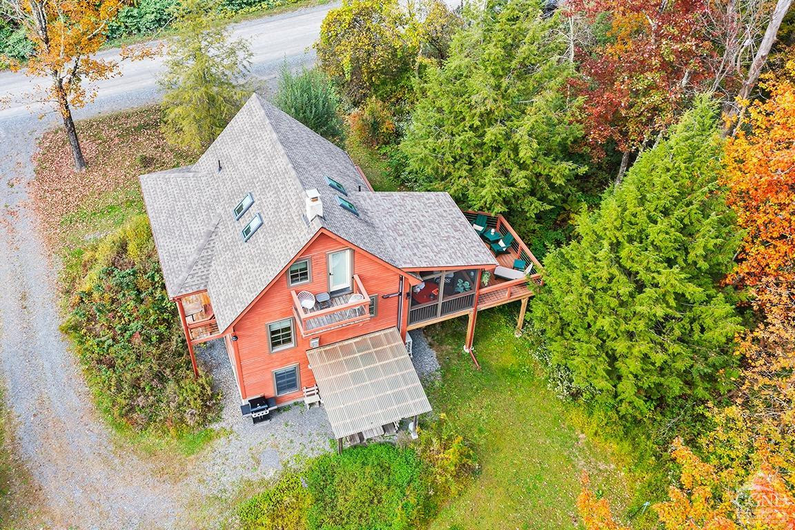 214 Fog Hill Road Austerlitz, NY 12017 - Photo 34 of 38 an aerial view of a house with swimming pool and large trees