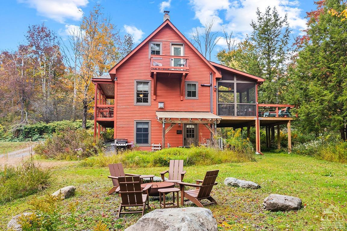 214 Fog Hill Road Austerlitz, NY 12017 - Photo 4 of 38 a front view of a house with garden