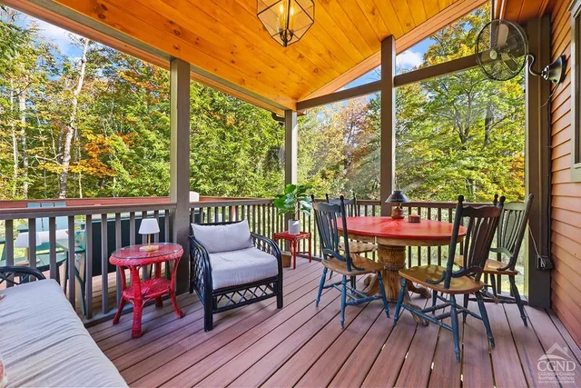 a view of a two chairs in the deck