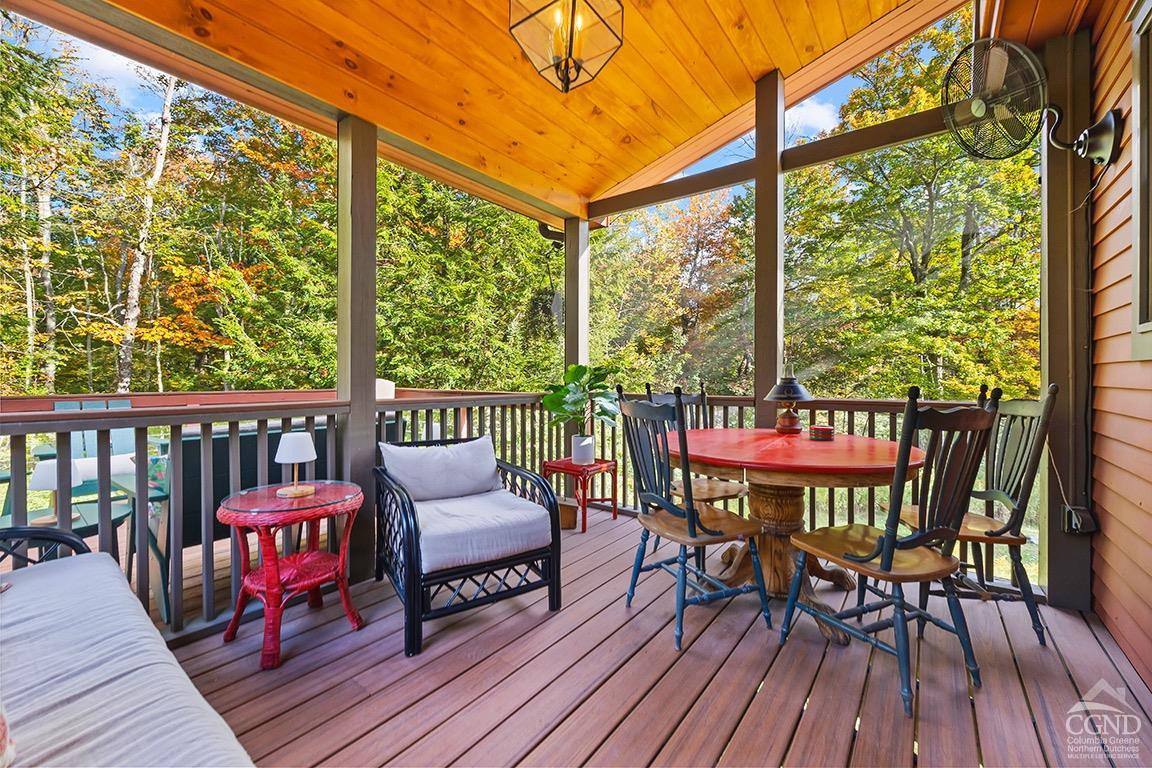 214 Fog Hill Road Austerlitz, NY 12017 - Photo 7 of 38 a view of a two chairs in the deck