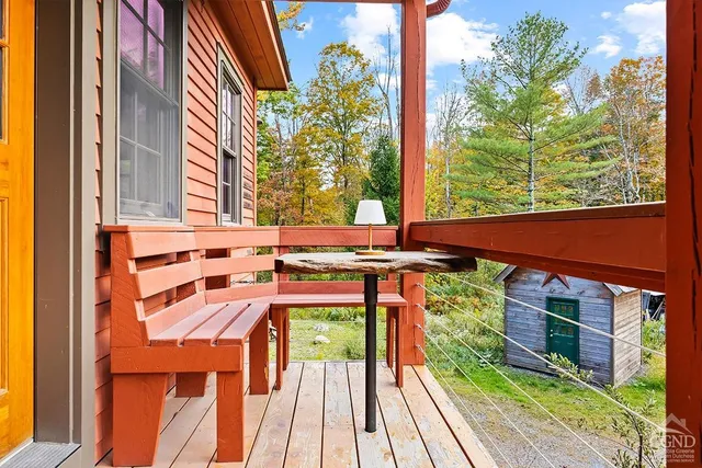 view of balcony with wooden floor and outdoor space