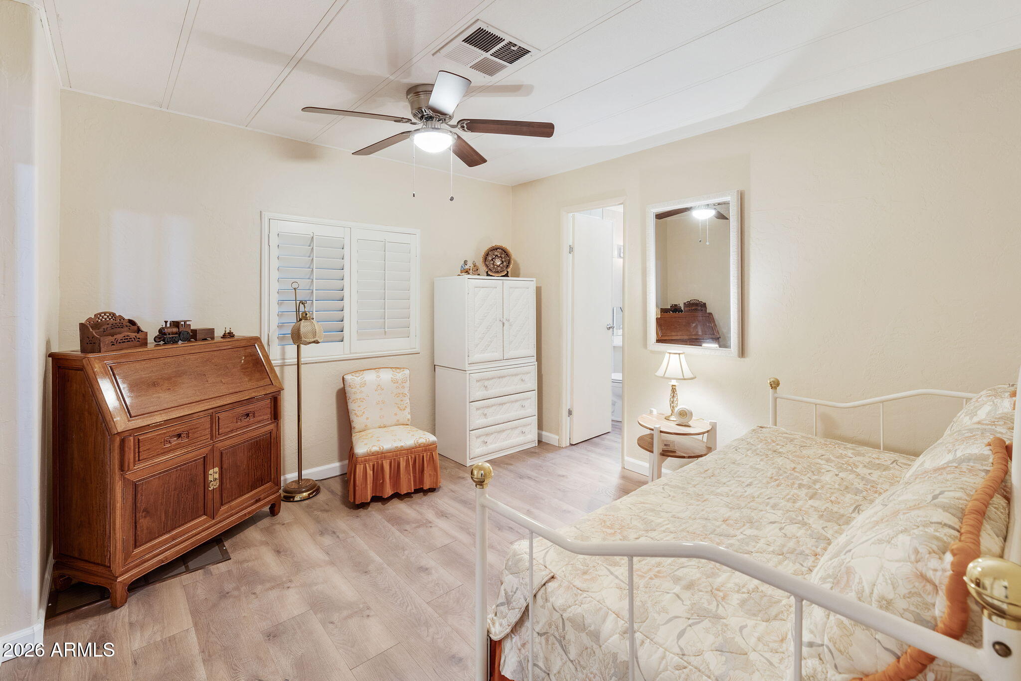2435 North Higley Road Mesa, AZ 85215 - Photo 44 of 84 a bedroom with a bed and furniture