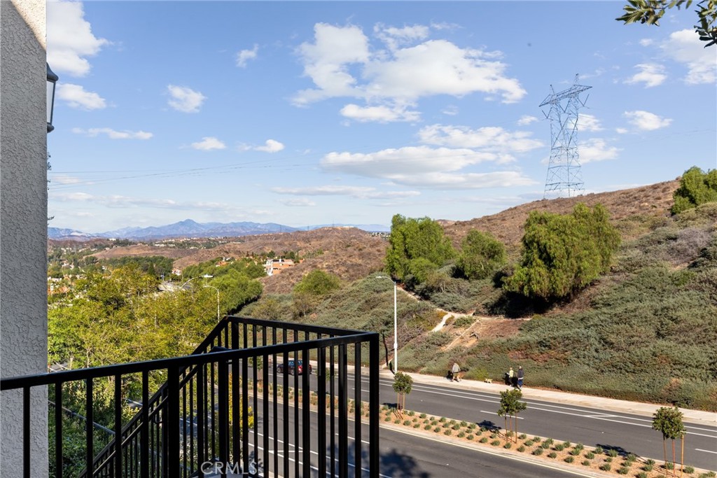 20000 Plum Canyon Road, Unit 221 Saugus, CA 91350 - Photo 18 of 30 a view of a city from a balcony