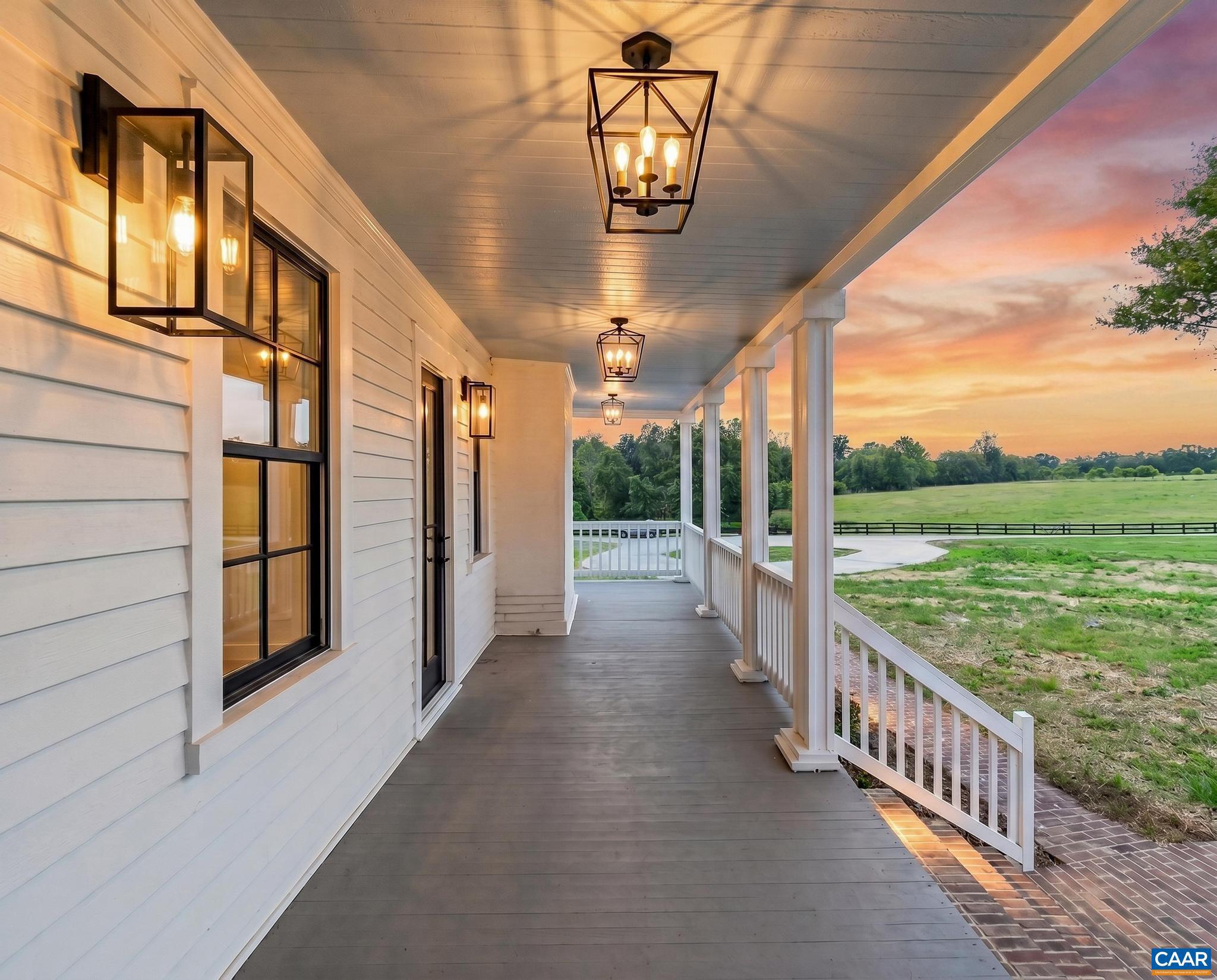 481 Race Ground Road Somerset, VA 22972 - Photo 52 of 53 a view of a porch with wooden floor and iron stairs