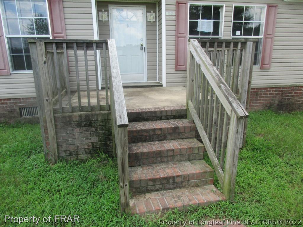 794 Wiggins Road Clinton, NC 28328 - Photo 2 of 18 a view of entryway with a front door