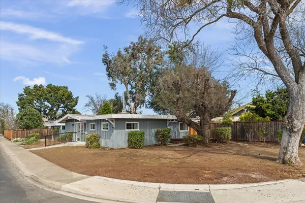 front view of a house with a street