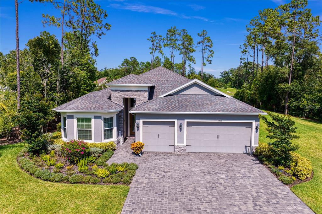 17805 Waterway Creek Drive Lutz, FL 33549 - Photo 1 of 61 a house with trees in the background