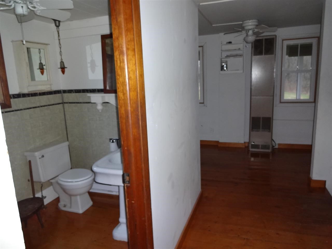 4991 South Ridge Road Oregon, IL 61061 - Photo 7 of 15 a bathroom with a toilet and a shower