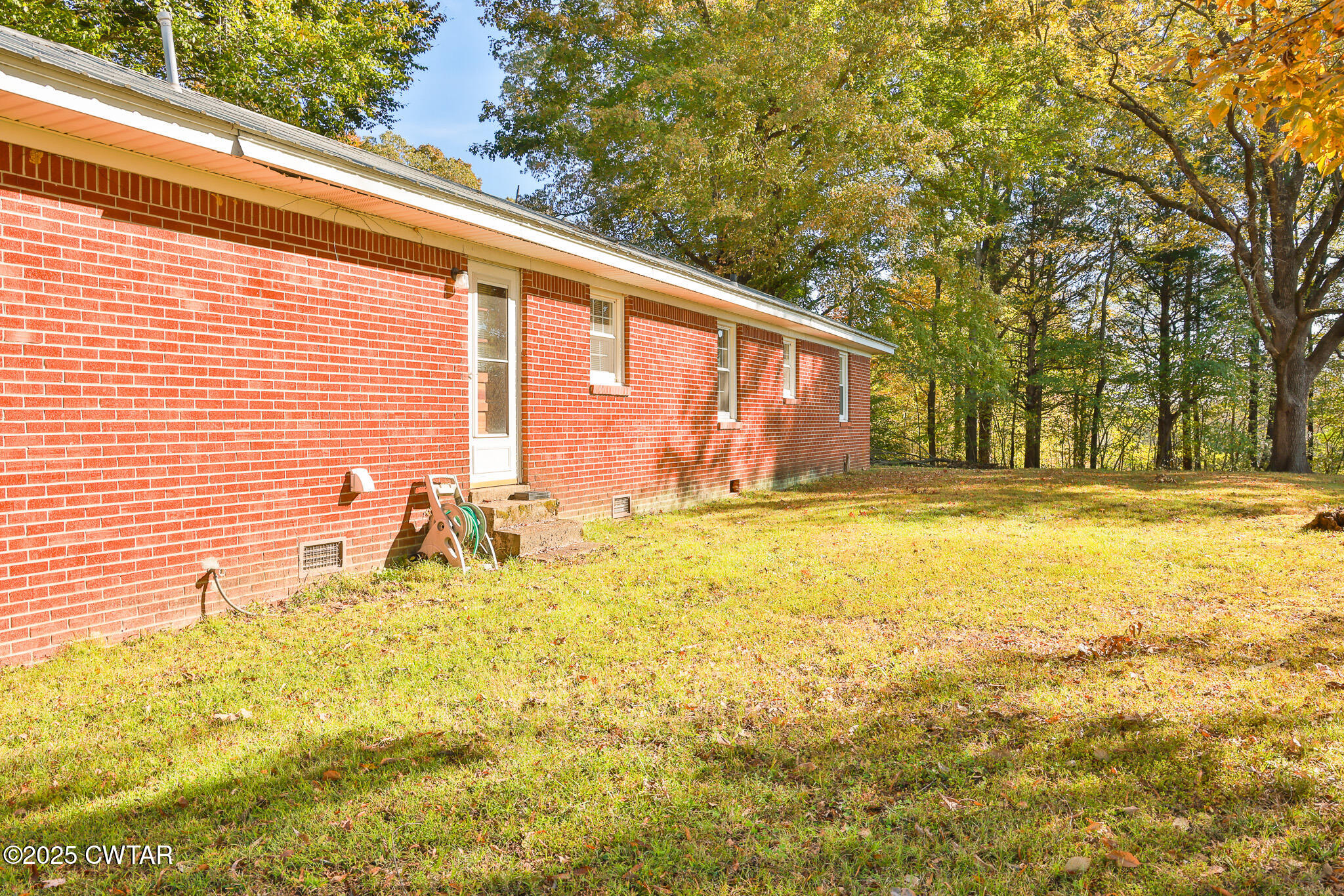 4030 Shades Bridge Road Greenfield, TN 38230 - Photo 19 of 27 a house view with swimming pool in front of it