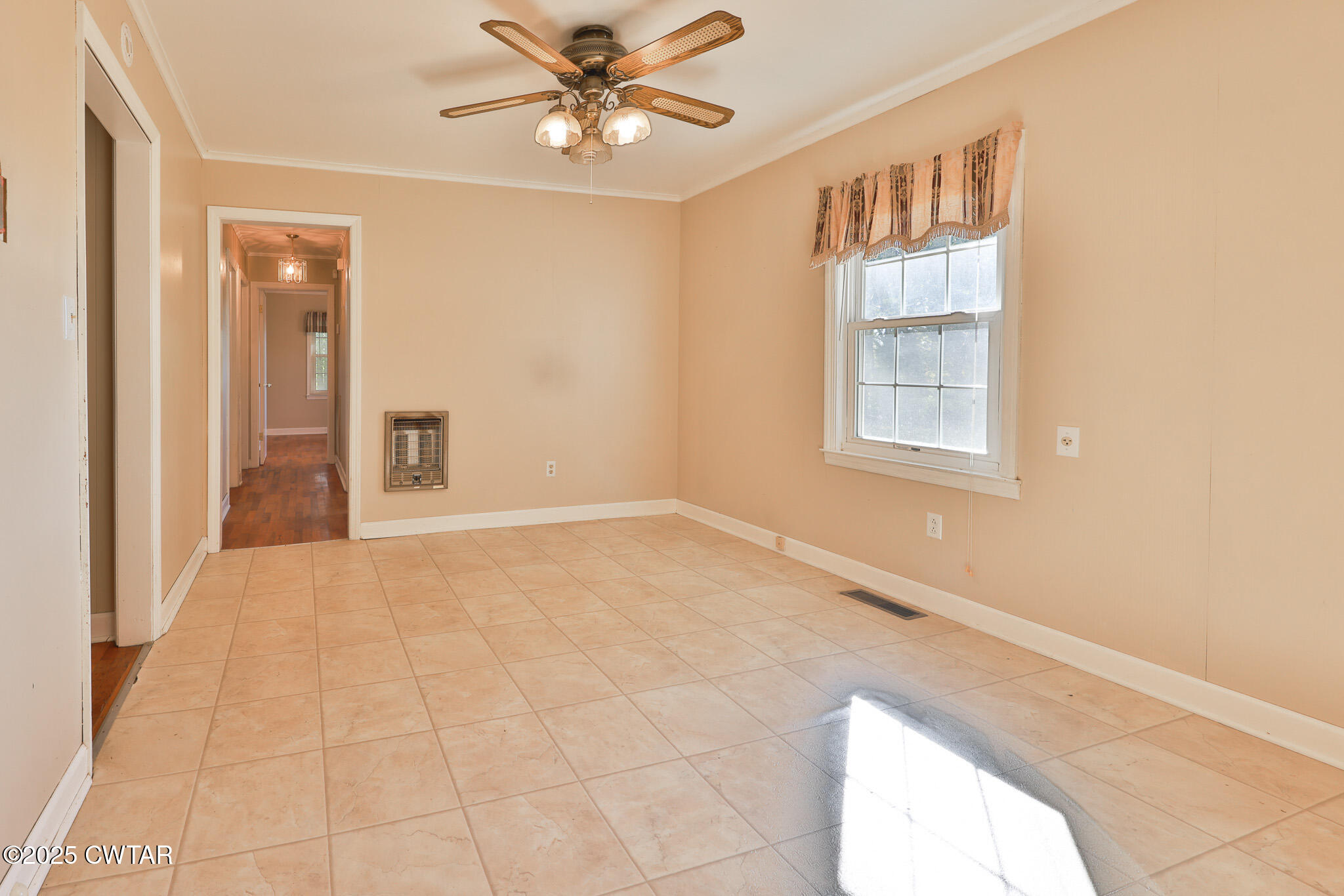 4030 Shades Bridge Road Greenfield, TN 38230 - Photo 5 of 27 a view of an empty room with a window