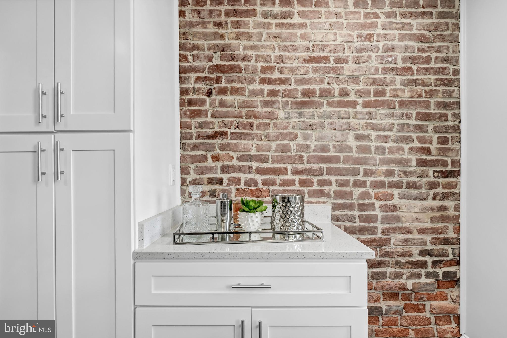 1314 Emerald Street Northeast Washington, DC 20002 - Photo 23 of 65 Kitchen/Exposed Brick Wall