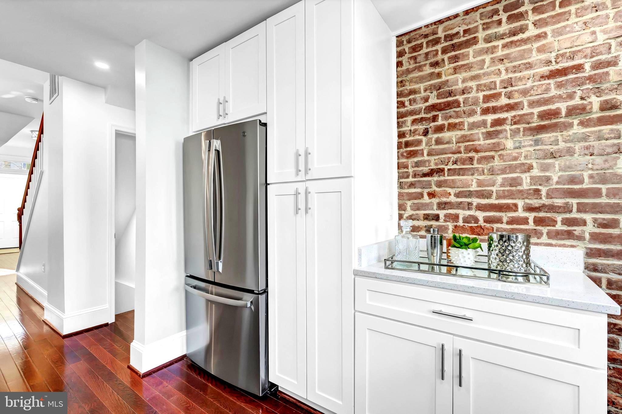 1314 Emerald Street Northeast Washington, DC 20002 - Photo 24 of 65 Kitchen with Exposed Brick