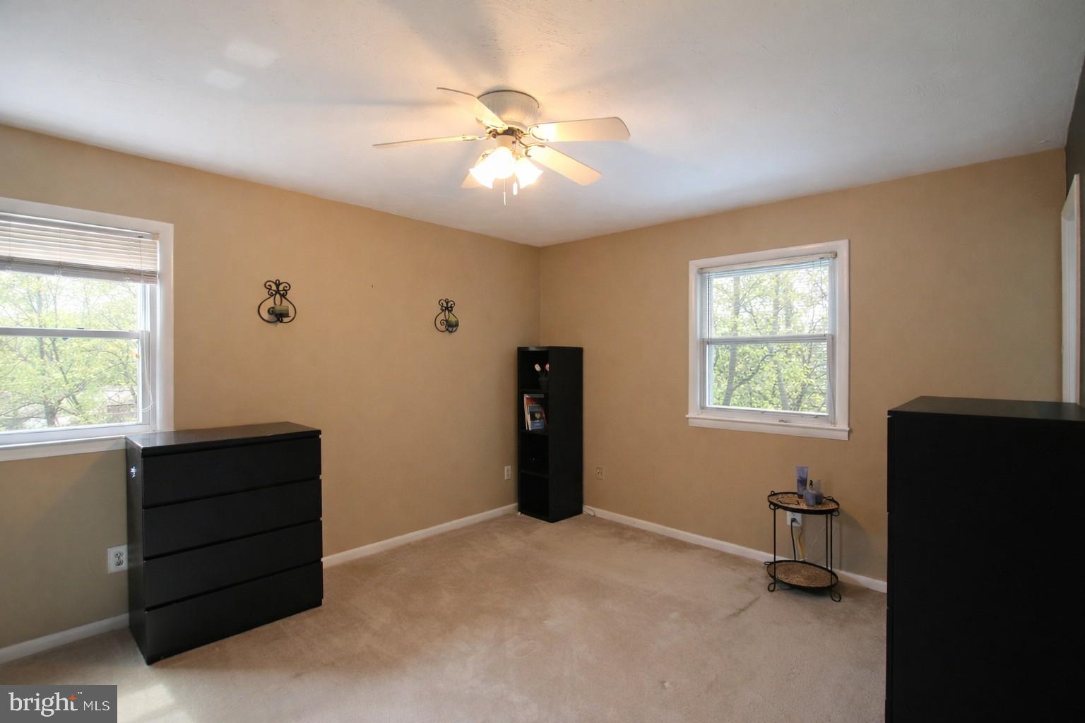 8502 Ivybridge Court Springfield, VA 22152 - Photo 19 of 31 a room with a bed and a window