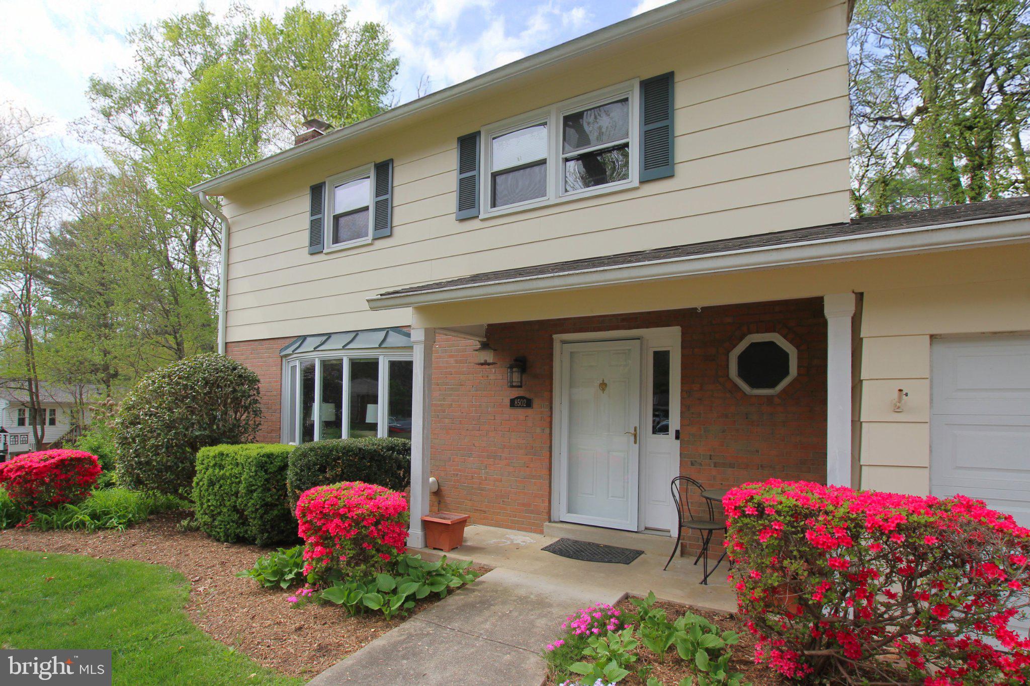 8502 Ivybridge Court Springfield, VA 22152 - Photo 2 of 31 a front view of a house with a yard