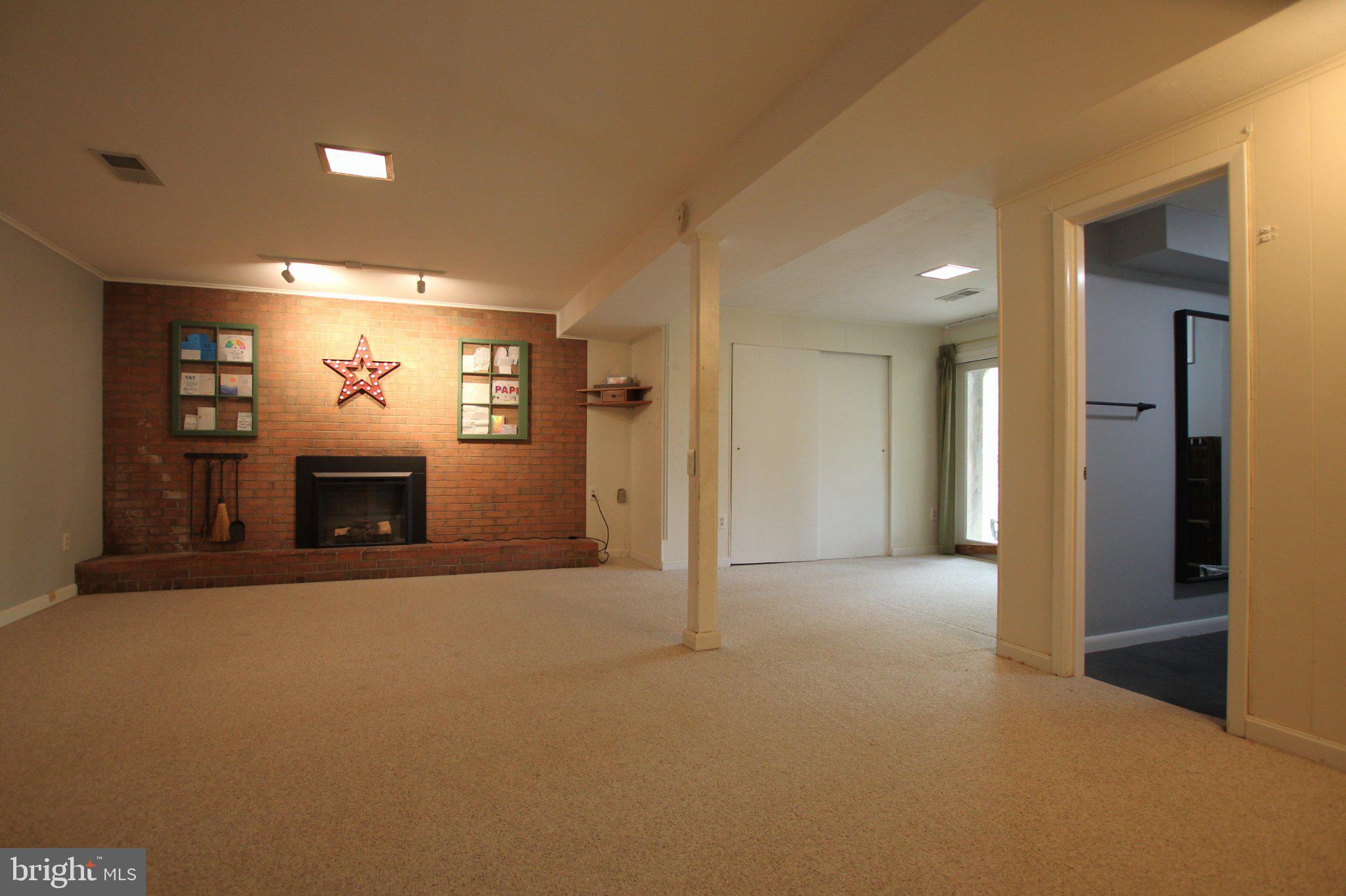 8502 Ivybridge Court Springfield, VA 22152 - Photo 26 of 31 a view of a livingroom with a fireplace