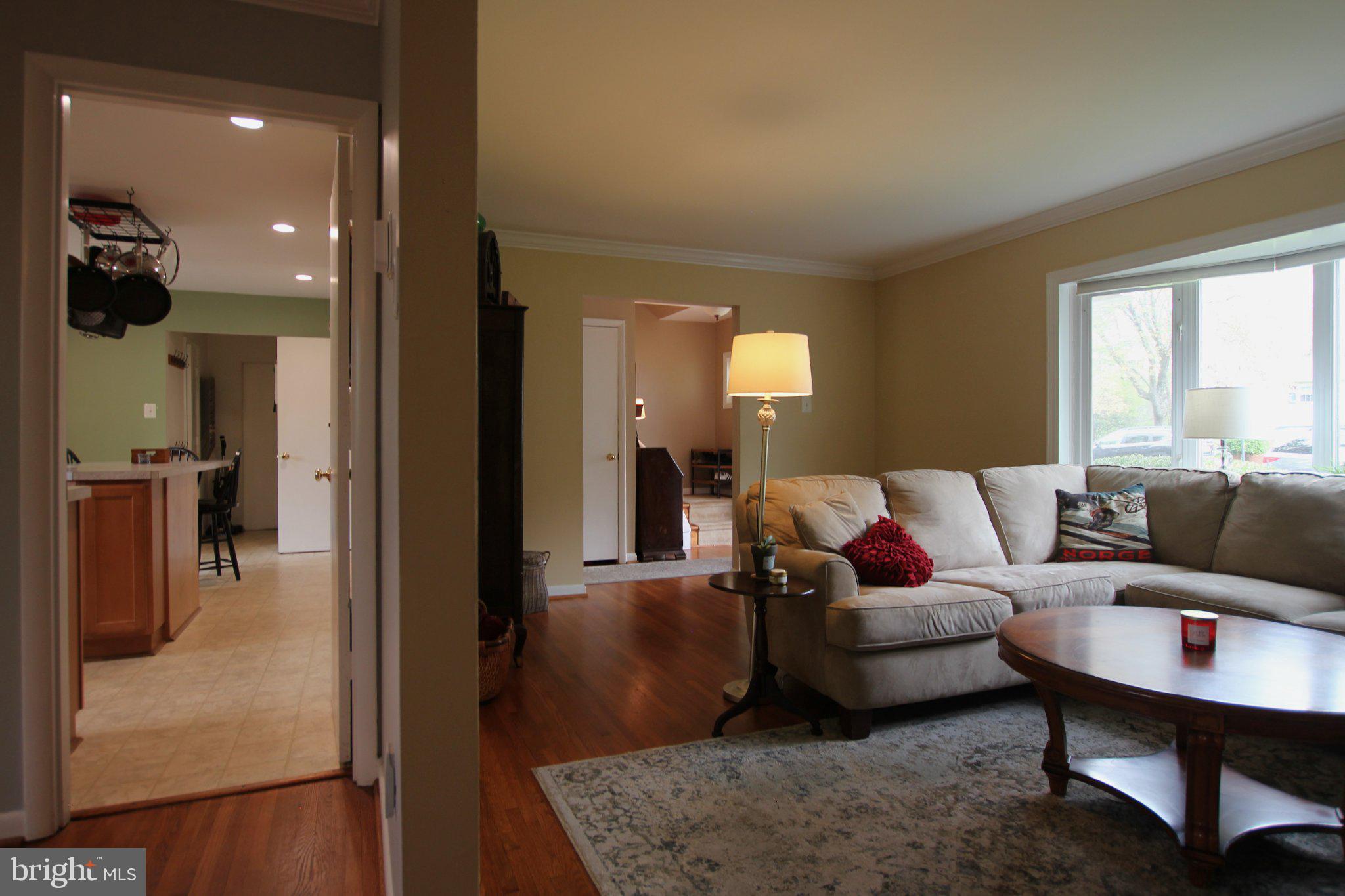 8502 Ivybridge Court Springfield, VA 22152 - Photo 5 of 31 a living room with furniture and a couch