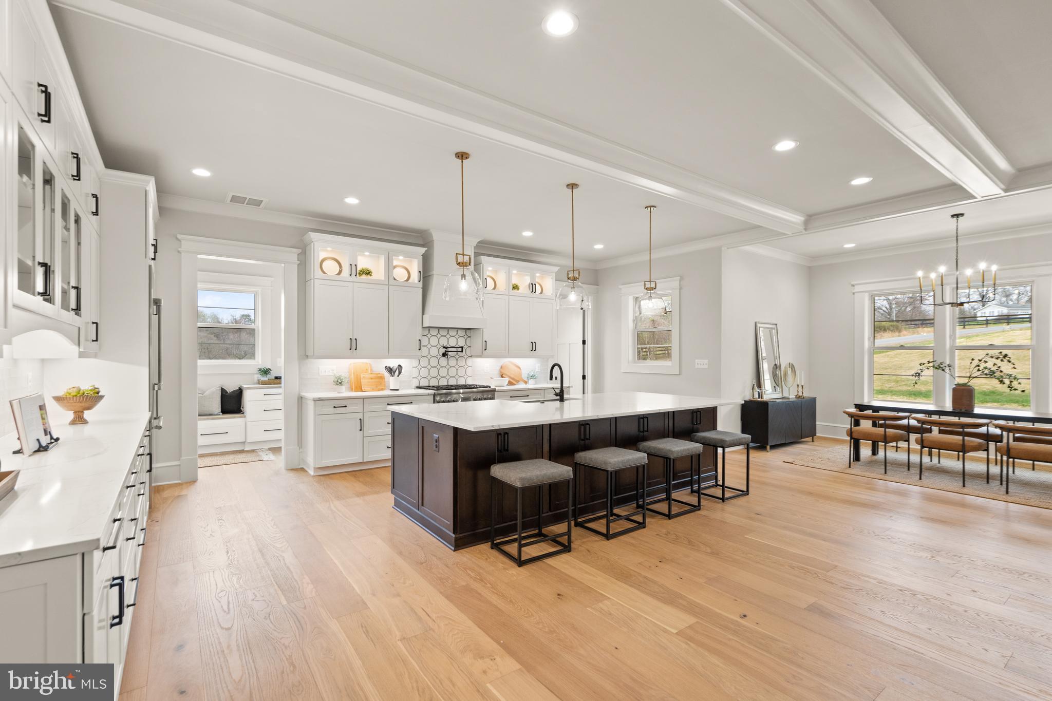 0 Greenwich Road Nokesville, VA 20181 - Photo 21 of 92 a large living room with stainless steel appliances kitchen island granite countertop furniture and a wooden floors