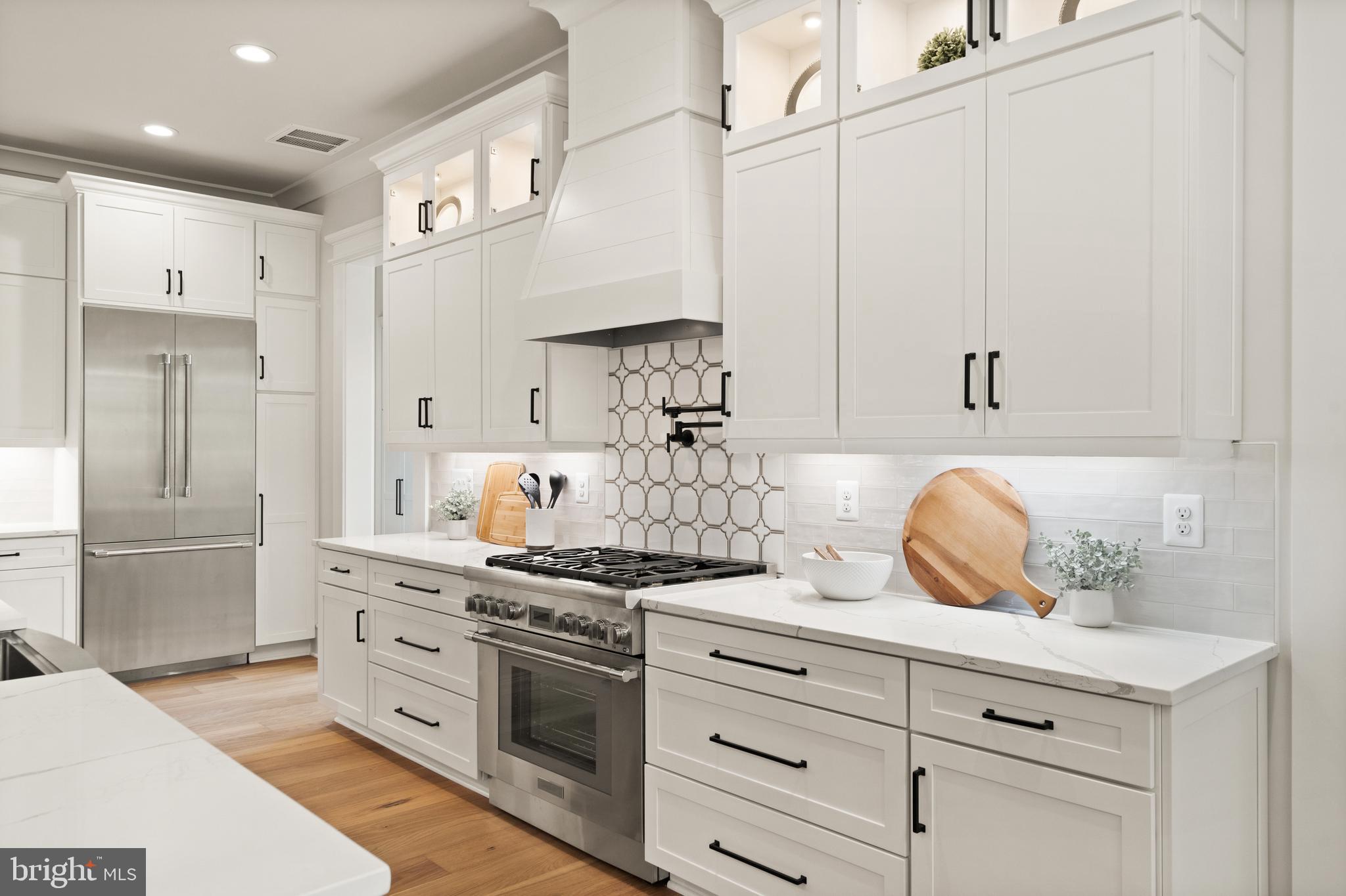 0 Greenwich Road Nokesville, VA 20181 - Photo 23 of 92 a kitchen with stainless steel appliances a stove a refrigerator and cabinets