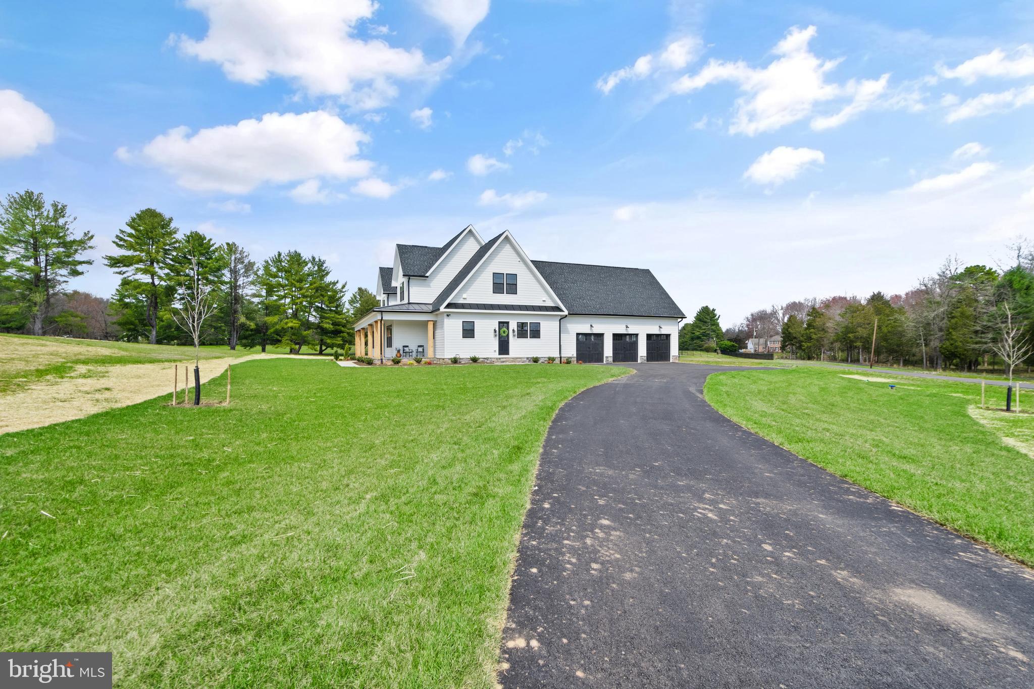 0 Greenwich Road Nokesville, VA 20181 - Photo 5 of 92 a front view of a house with garden