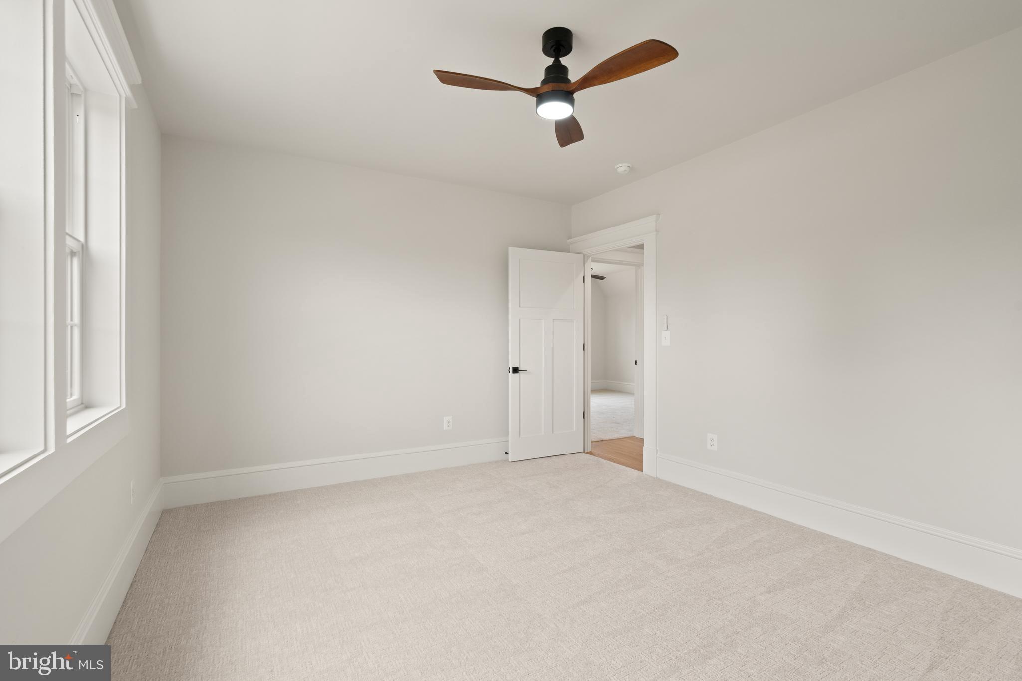 0 Greenwich Road Nokesville, VA 20181 - Photo 58 of 92 an empty room with a window and a fan