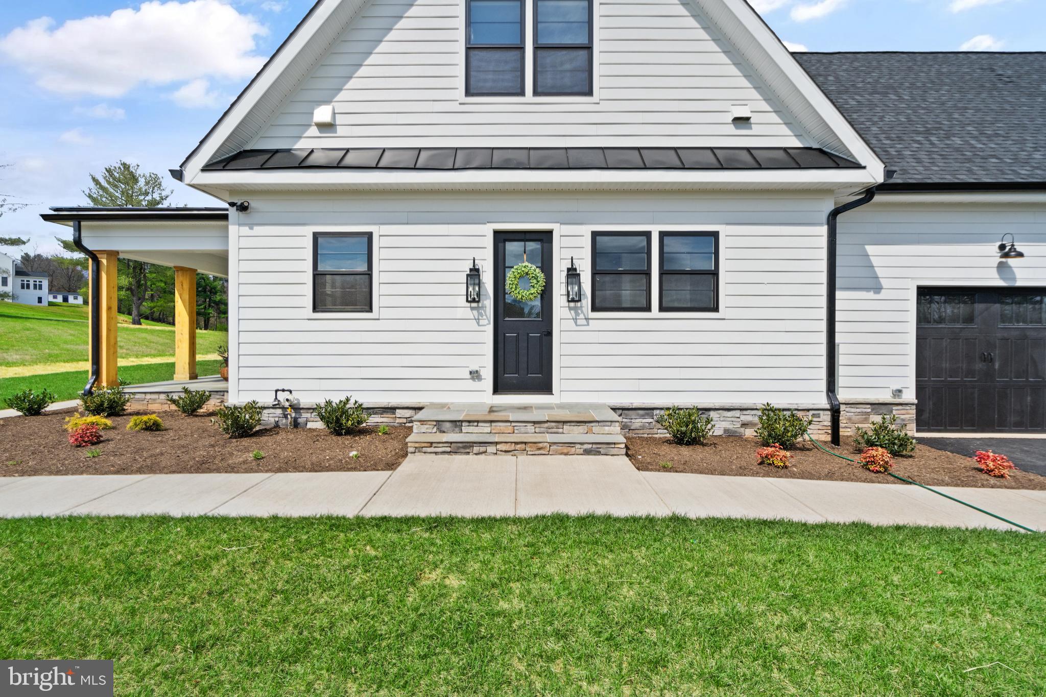 0 Greenwich Road Nokesville, VA 20181 - Photo 77 of 92 a front view of a house with garden