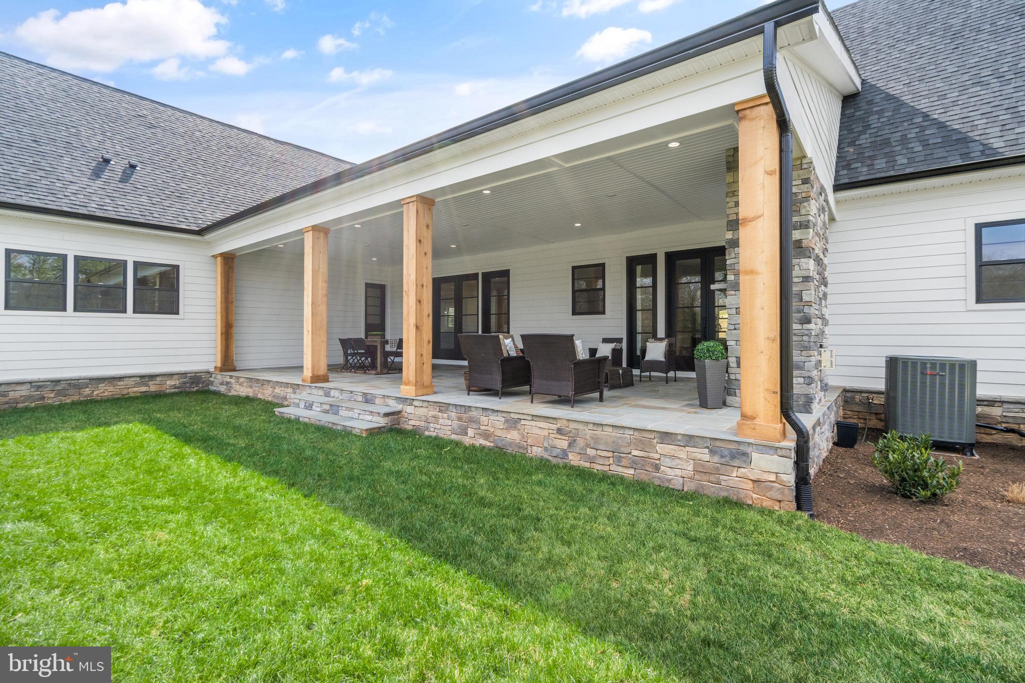 0 Greenwich Road Nokesville, VA 20181 - Photo 86 of 92 a view of a house with backyard porch and outdoor seating