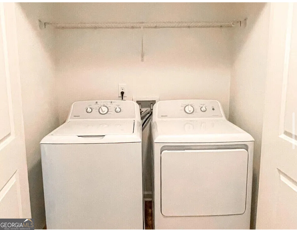 2686 Avanti Way Decatur, GA 30035 - Photo 4 of 6 a utility room with dryer and washer