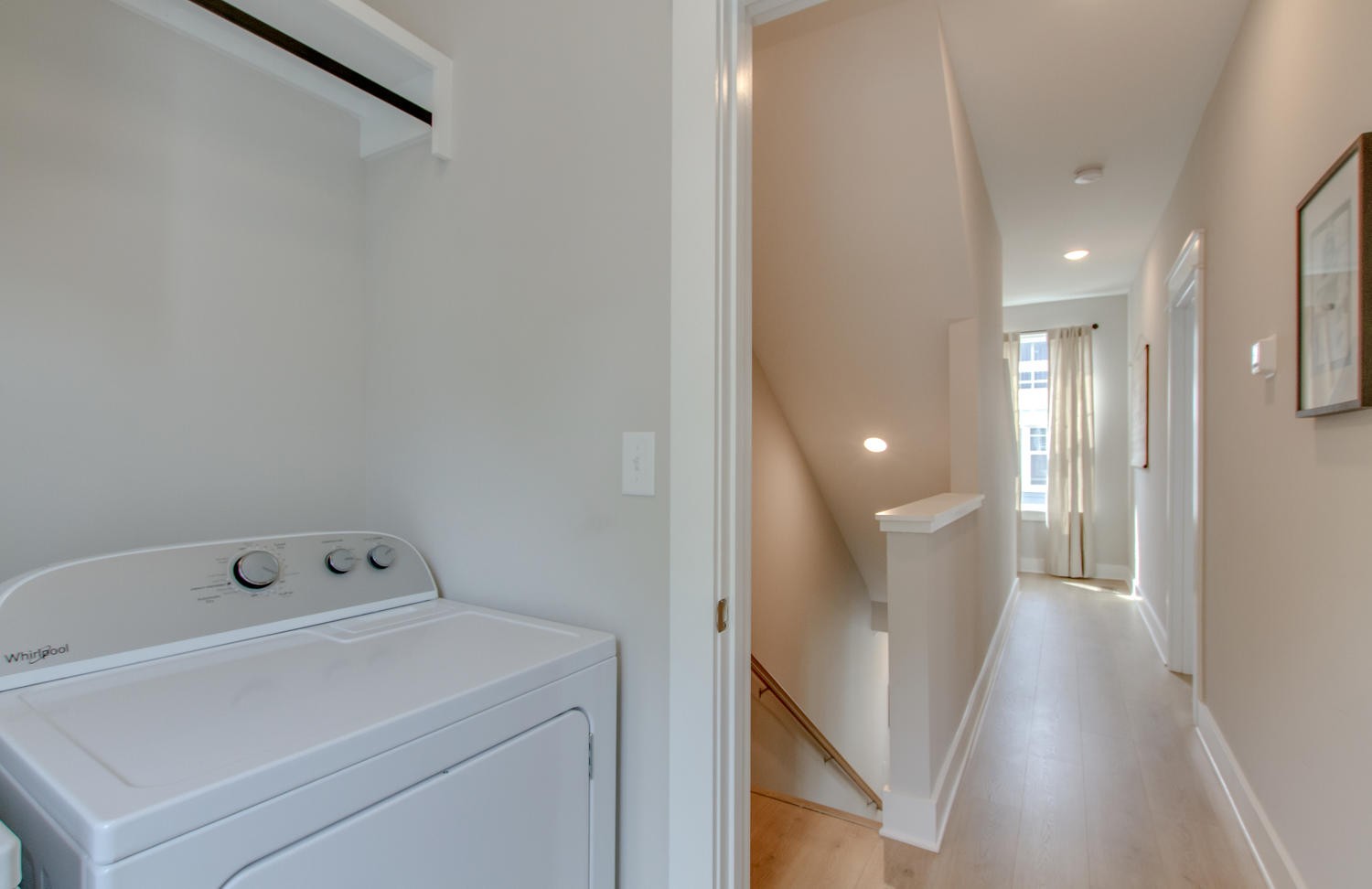 105 Duke Street, Unit 7 Nashville, TN 37207 - Photo 12 of 26 a view of a hallway with washer and dryer