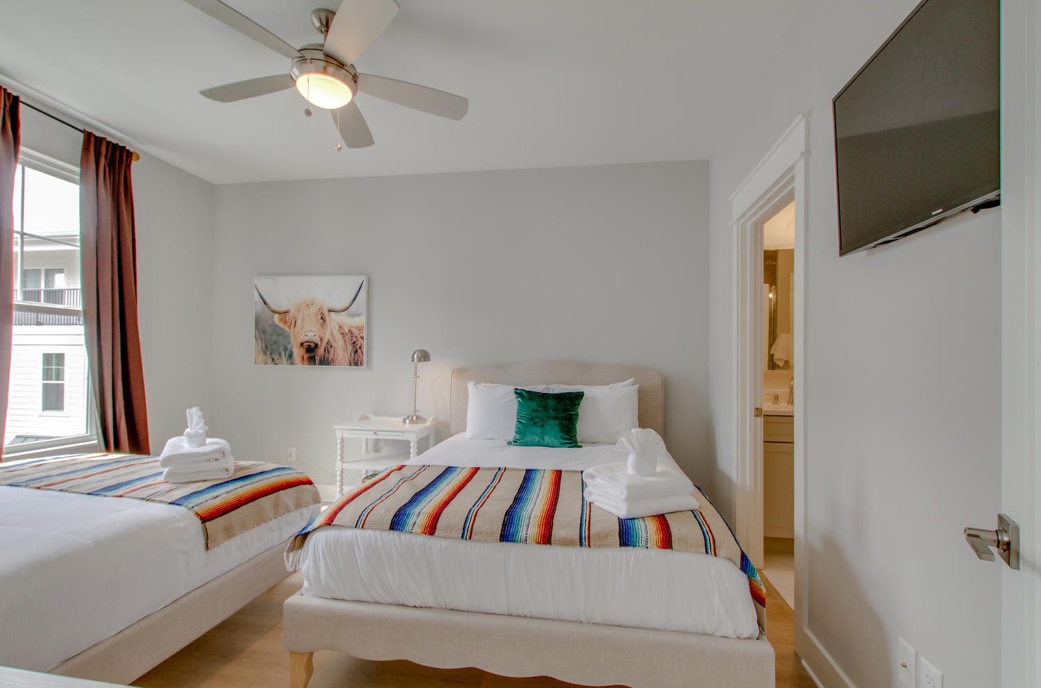 105 Duke Street, Unit 7 Nashville, TN 37207 - Photo 13 of 26 a bedroom with a bed and a flat screen tv