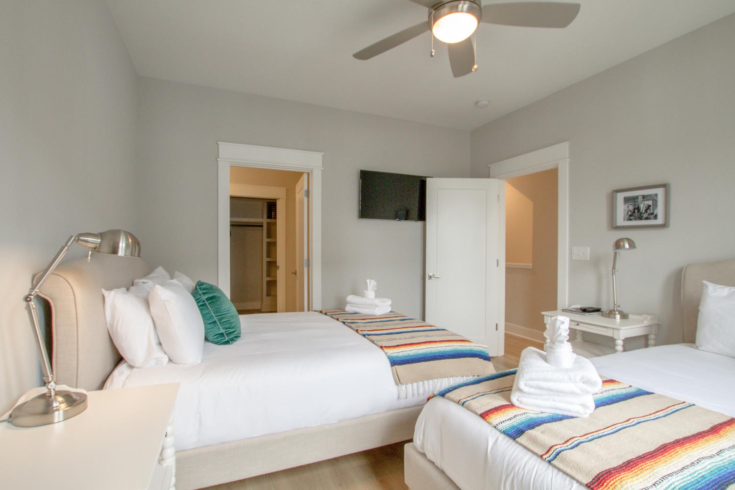 105 Duke Street, Unit 7 Nashville, TN 37207 - Photo 15 of 26 a bedroom with two beds and a chandelier