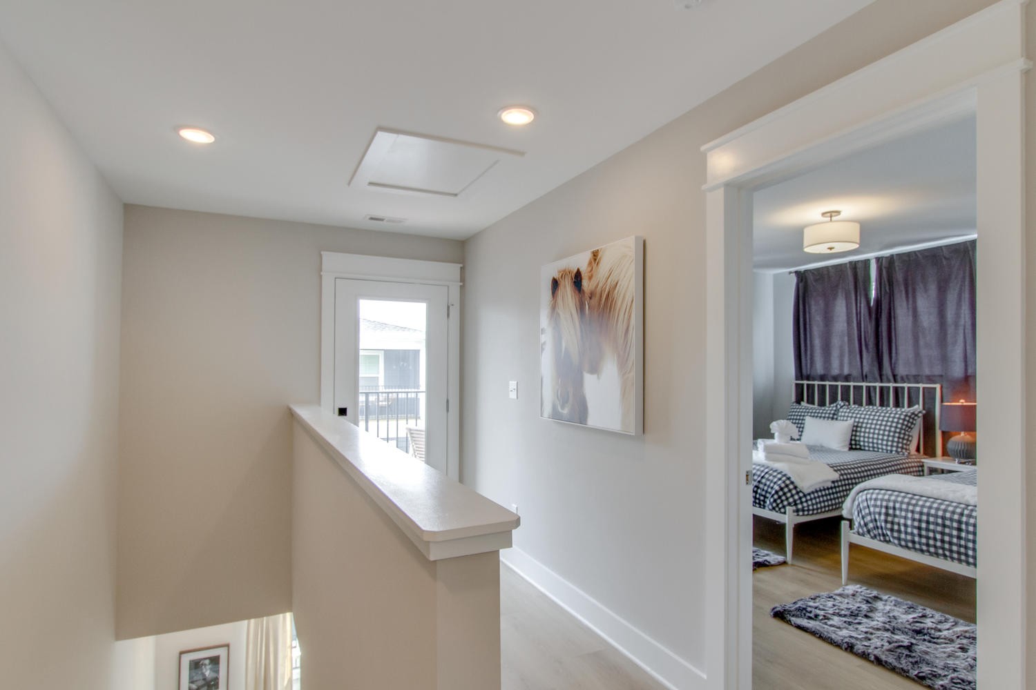 105 Duke Street, Unit 7 Nashville, TN 37207 - Photo 21 of 26 a hallway with a large mirror and furniture