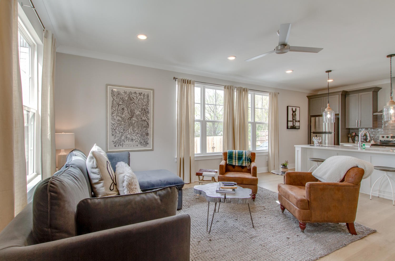 105 Duke Street, Unit 7 Nashville, TN 37207 - Photo 4 of 26 a living room with furniture and a large window