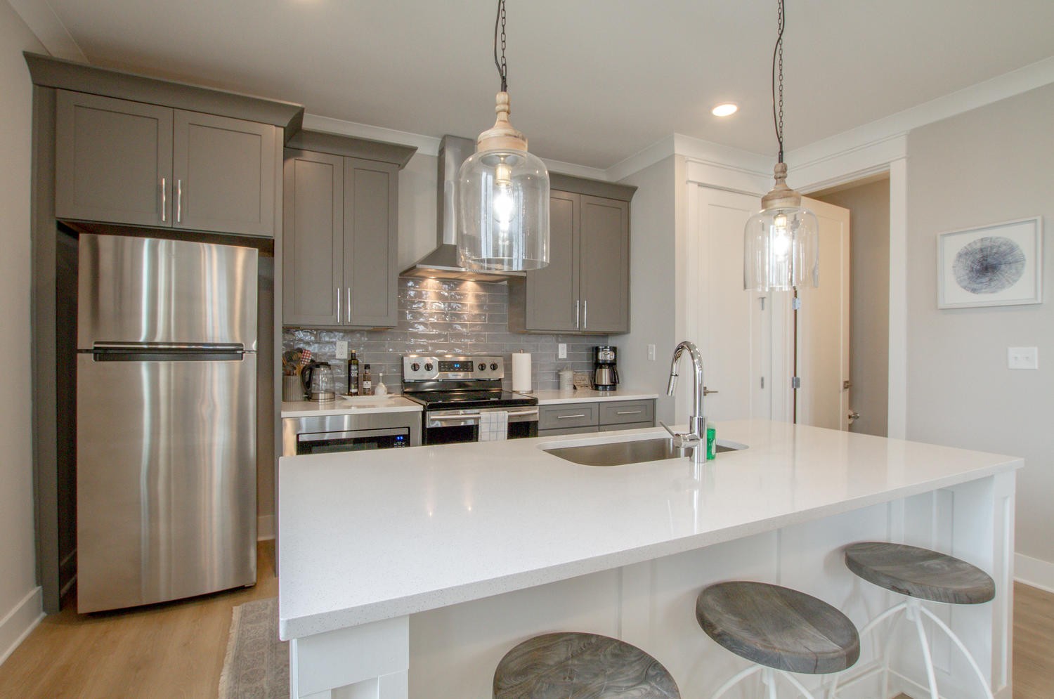 105 Duke Street, Unit 7 Nashville, TN 37207 - Photo 10 of 26 a kitchen with stainless steel appliances a sink a stove a refrigerator and cabinets