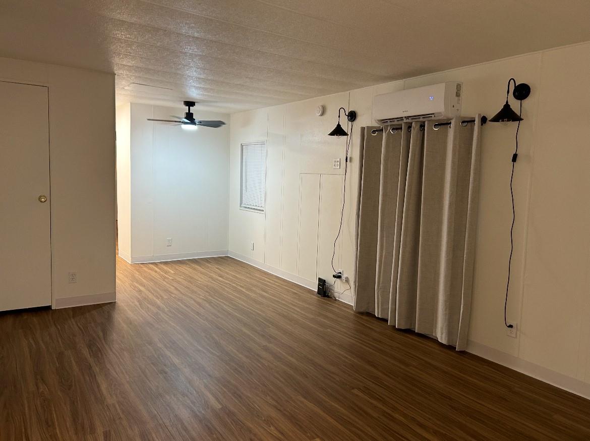 40845 Jean Road East Oakhurst, CA 93644 - Photo 5 of 16 a view of empty room with wooden floor