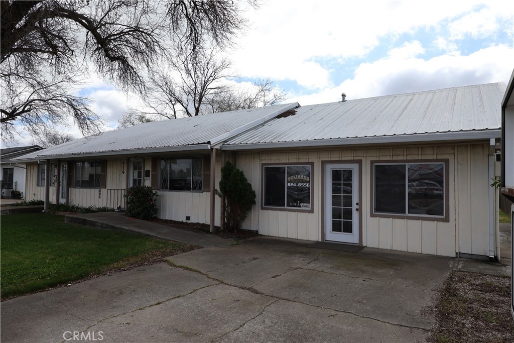 519 Solano Street Corning, CA 96021 - Photo 1 of 4 a view of a house with a garden