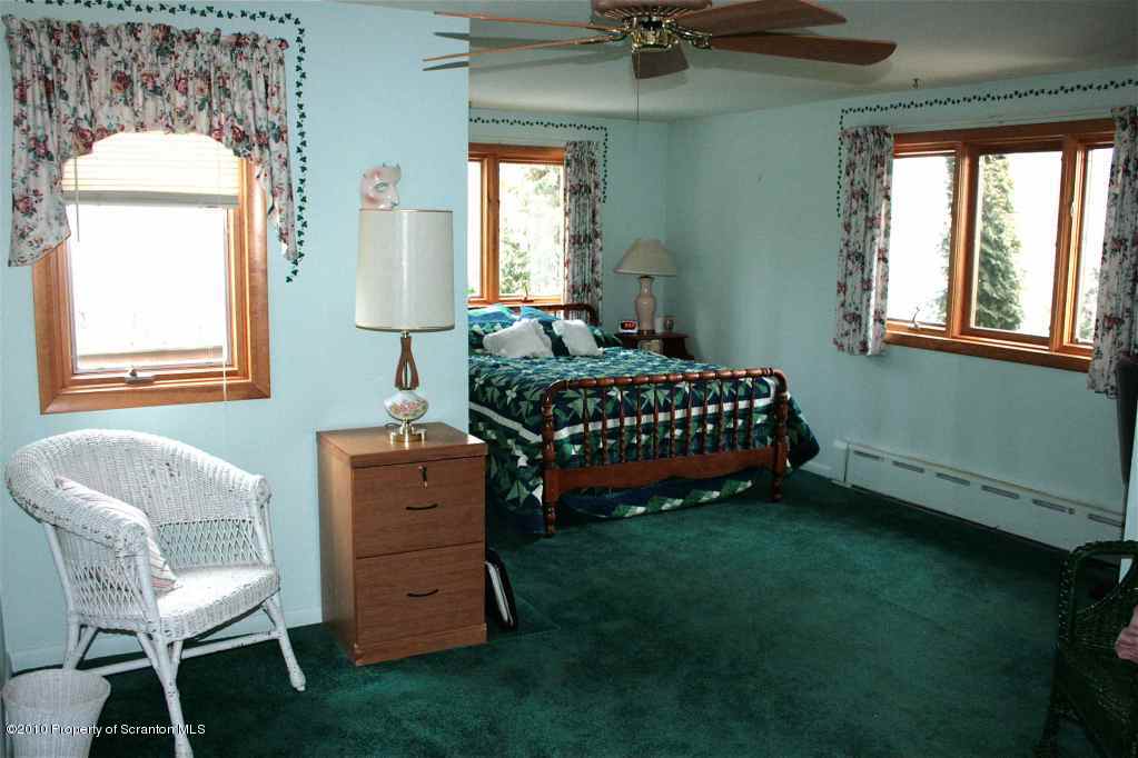 Rr1 Rr1 Road Factoryville, PA 18419 - Photo 14 of 19 a bedroom with a bed and a window