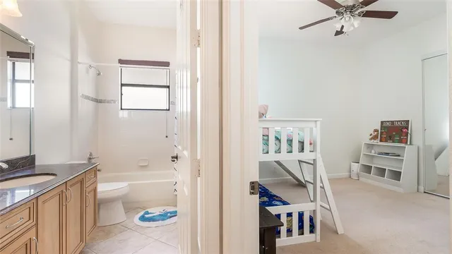a utility room with sink dryer and washer