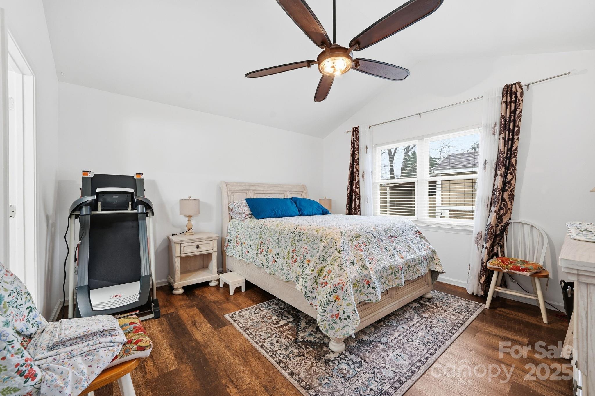13512 Michael Lynn Road Charlotte, NC 28278 - Photo 17 of 36 a bedroom with a bed and wooden floor