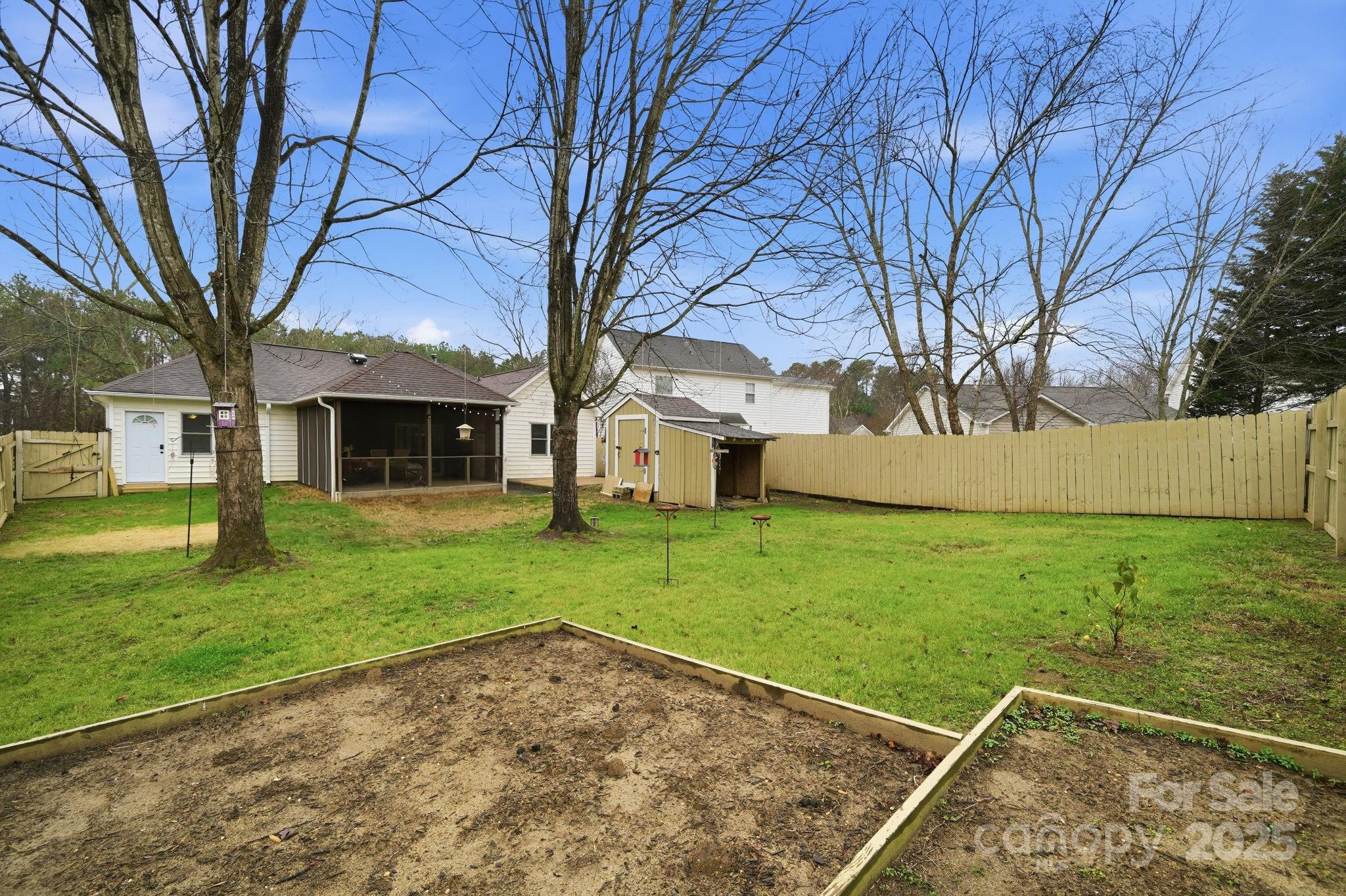 13512 Michael Lynn Road Charlotte, NC 28278 - Photo 34 of 36 a view of a backyard with large tree