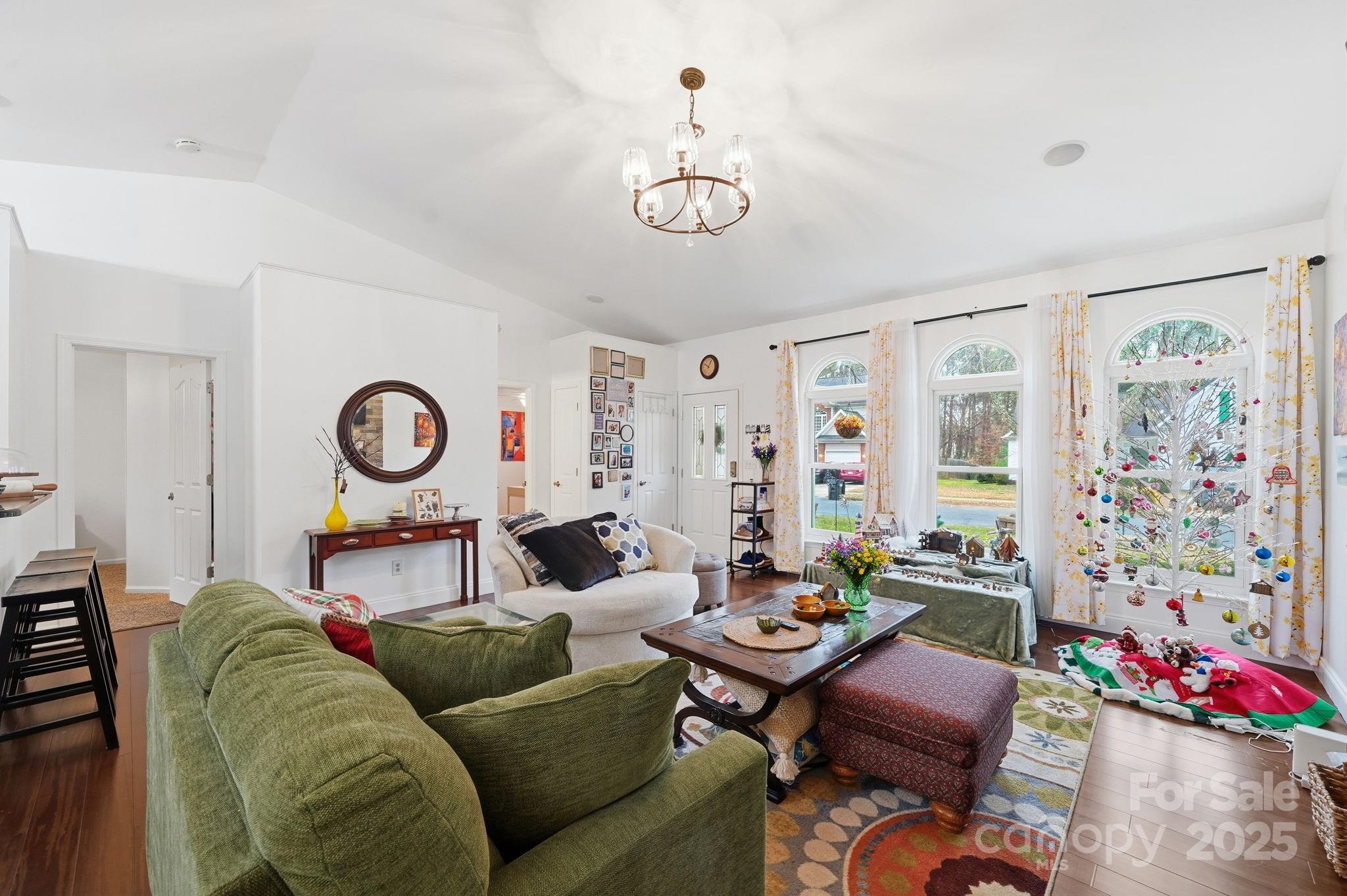 13512 Michael Lynn Road Charlotte, NC 28278 - Photo 9 of 36 a living room with furniture a rug and a window