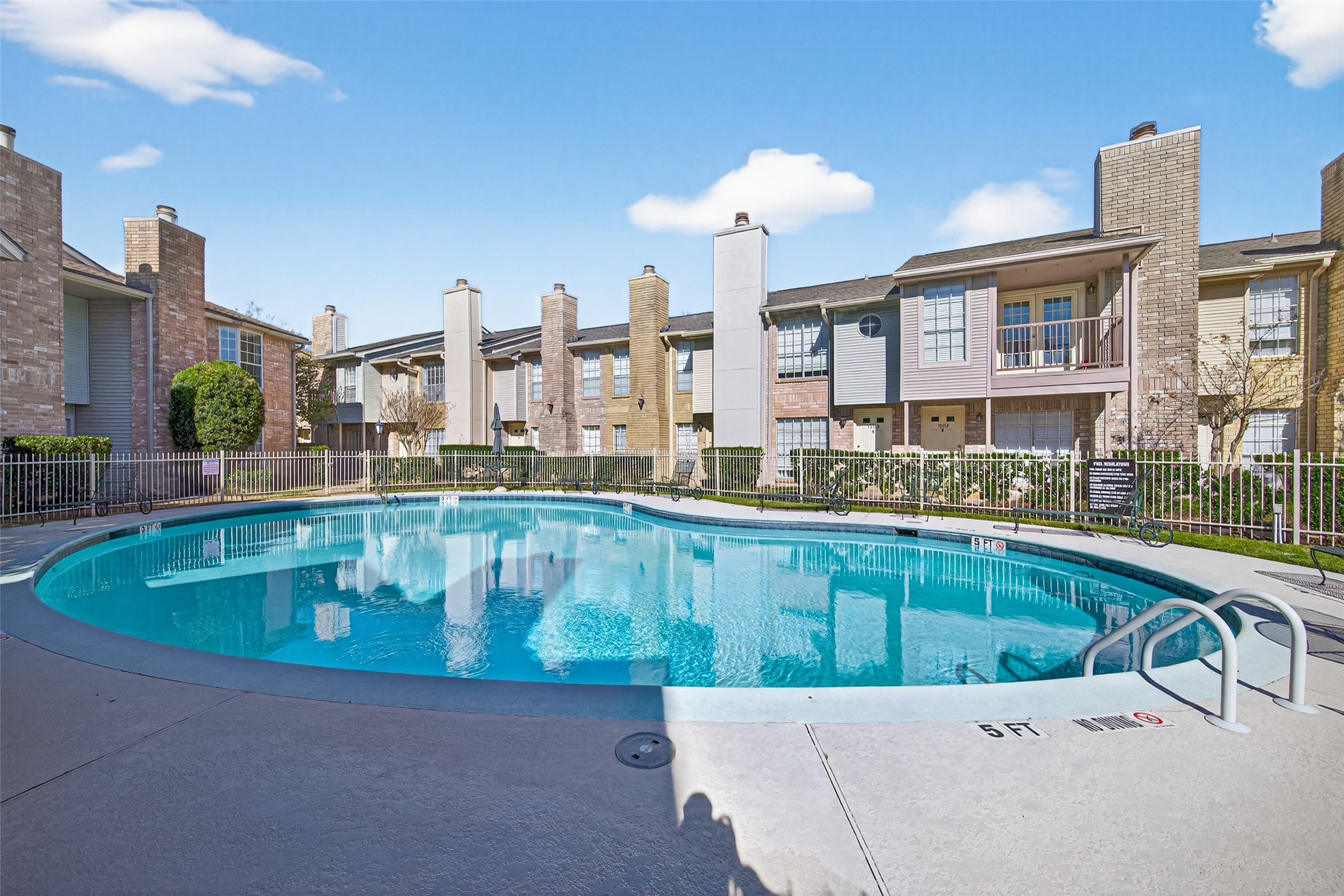 3100 Jeanetta Street, Unit 1004 Houston, TX 77063 - Photo 41 of 42 The community pool serves as the crown jewel of this enclave, providing a refreshing escape just steps from your front door.